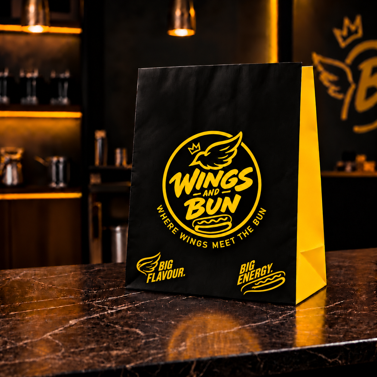 Wings and Bun approved black takeaway bag with yellow side and wing and hot dog bun graphics